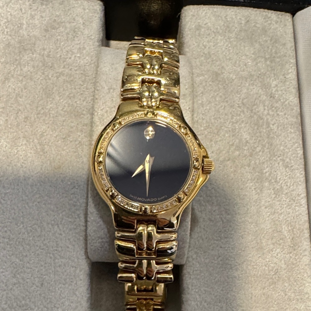 Movado Gold Watch with Black Dial